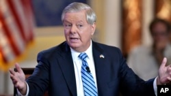 FILE - Republican Senator Lindsey Graham speaks during a debate at the Edward M. Kennedy Institute in Boston, Massachusetts, June 13, 2022.