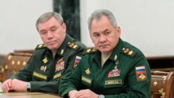 Bộ trưởng Quốc phòng Nga Sergei Shoigu, bên phải