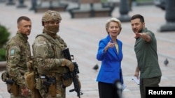 European Commission President Ursula von der Leyen and Ukraine's President Volodymyr Zelenskyy leave a joint news conference, as Russia's invasion of Ukraine continues, in Kyiv, Ukraine.